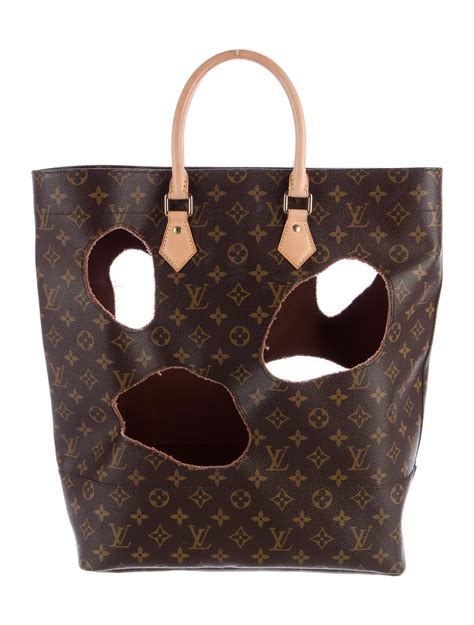 louis vuitton bag with holes